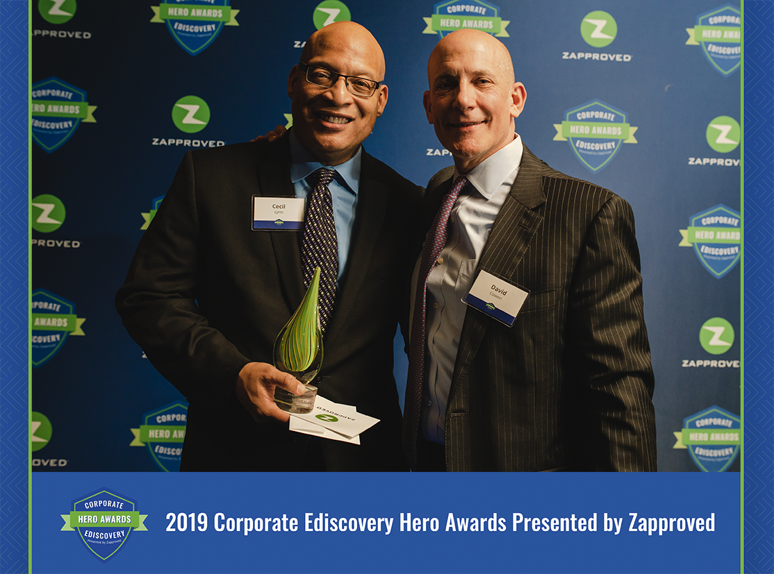 Cecil Lynn accepting a 2019 Corporate Ediscovery Hero Award